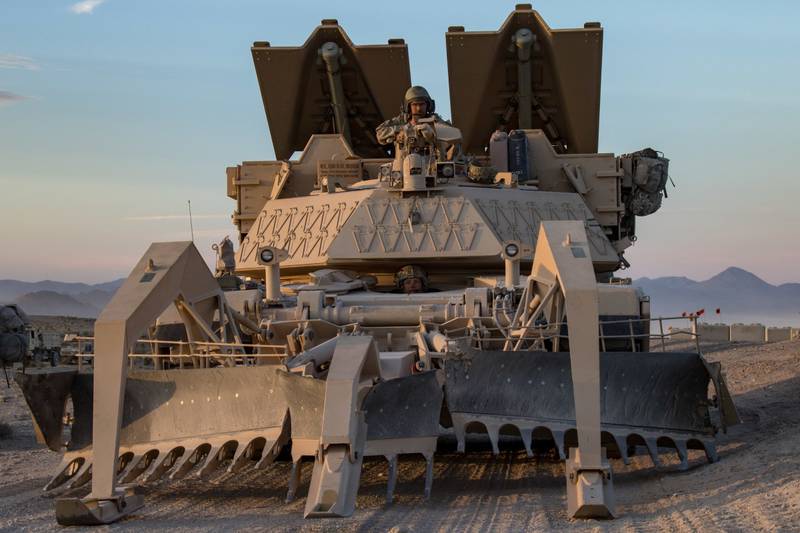Soldiers position their M1150 Assault Breacher Vehicle during a live-fire training exercise at the National Training Center in Fort Irwin, Calif., June 12, 2019.