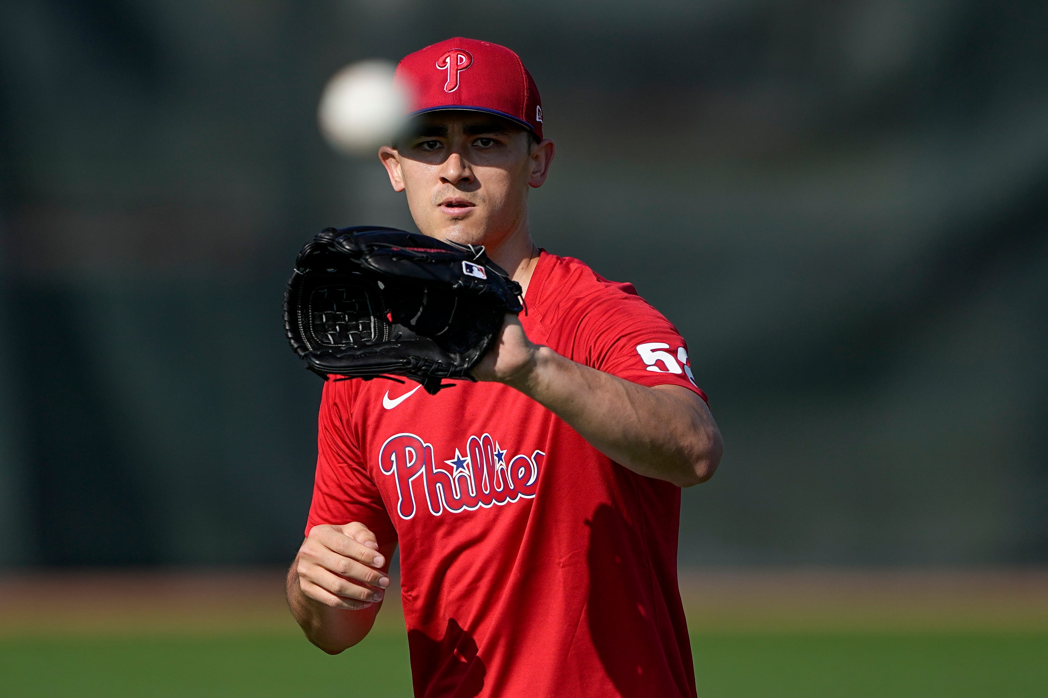 Philadelphia Phillies pitcher Noah Song warms up at their baseball spring training facility in Clearwater, Fla., Thursday, Feb. 23, 2023.