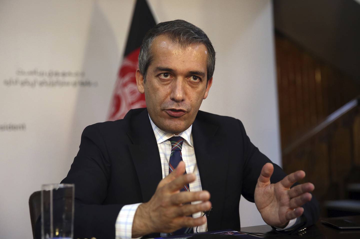 Afghan presidential spokesman Sediq Seddiqi gives an interview to The Associated Press in Kabul, Afghanistan, Monday, Aug. 17, 2020.
