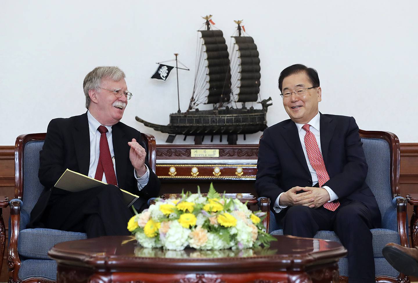 U.S. National Security Adviser John Bolton, left, talks with South Korean National Security Adviser Chung Eui-yong during a meeting at the presidential Blue House in Seoul, South Korea, Wednesday, July 24, 2019.