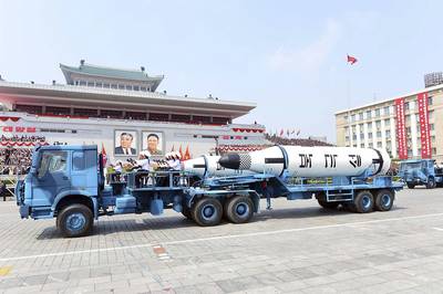 In this April 15, 2017, file photo, Polaris submarine launched ballistic missiles (SLBM) are paraded to celebrate the 105th birthday of Kim Il Sung, the country's late founder, in Pyongyang, North Korea.
