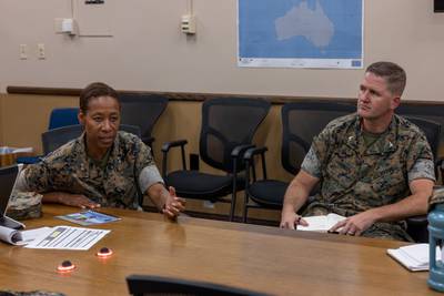U.S. Marine Corps Col. Jason Quinter, right, listens to Maj. Gen. Lorna Mahlock during a meeting at Marine Corps Air Station Miramar, California, in July 2023.