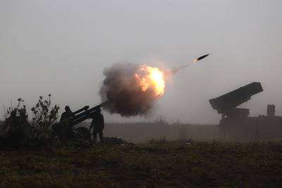 Indonesian marines fire an artillery round during an amphibious landing operation at the Super Garuda Shield multi-national military exercise in Situbondo, East Java, Indonesia, Sunday, Sept. 10, 2023.