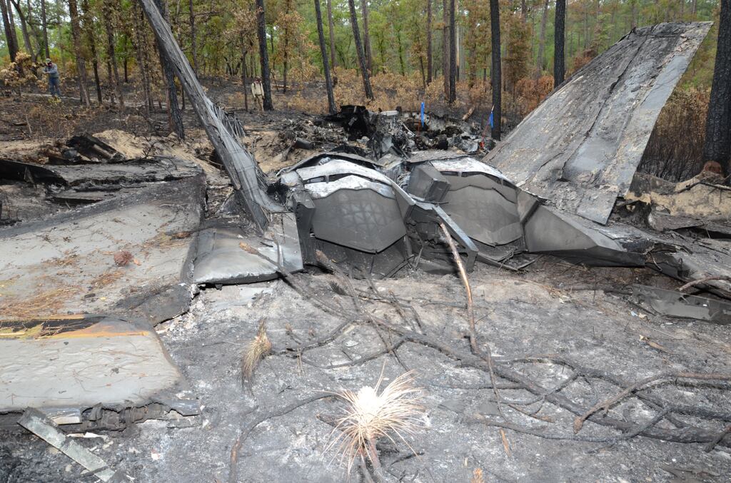 Photos of the wreckage of an F-22 Raptor fighter jet that crashed on May 15, 2020, were included in an Air Force investigation report obtained by Air Force Times via the Freedom of Information Act. (Air Force)